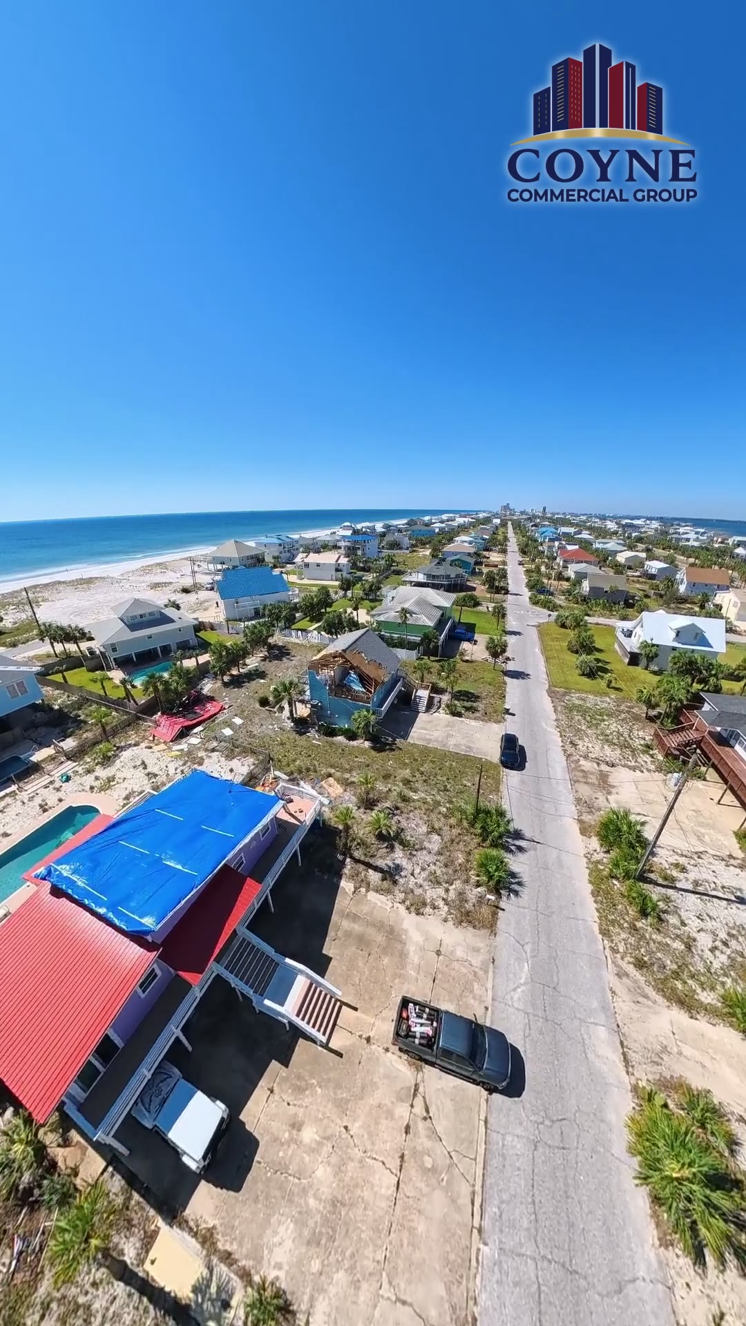 Pensacola Beach flyover: Gulf-front condos and commercial buildings